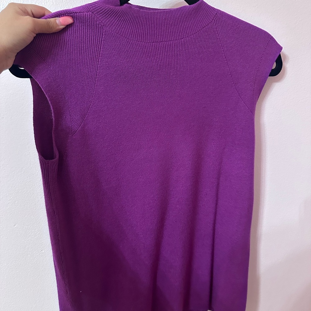 Purple sleeveless turtleneck sweater